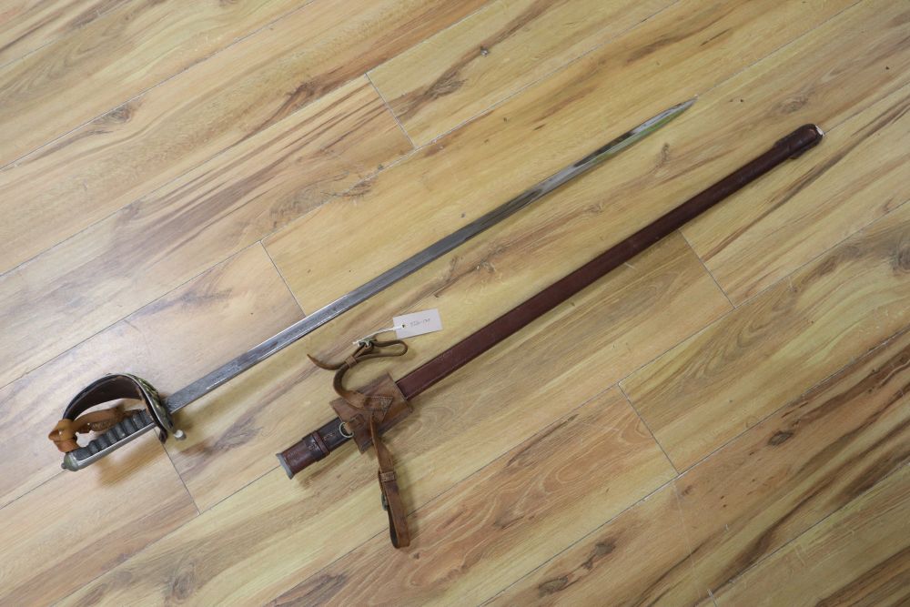 A 1912 Pattern Cavalry sword ER II, shagreen grip and 94cm etched, single edged blade, leather scabbard